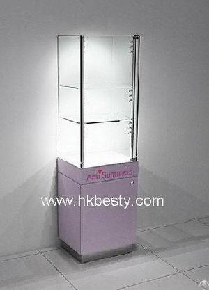 Three Glass Shelves With Glass Door With Wooden Frame Used In Jewellery Display