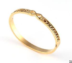 Cuff Bangle Designs Yellow Gold Plated Bangle With Twisted Chain Imbeded In The Middle