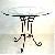 Round Glass Top Wrought Iron Base Table Manufacturer, Exporter And Wholesaler India